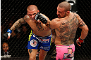 LONDON, ENGLAND - FEBRUARY 16:  (L-R) Dustin Poirier punches Cub Swanson in their featherweight fight during the UFC on Fuel TV event on February 16, 2013 at Wembley Arena in London, England.  (Photo by Josh Hedges/Zuffa LLC/Zuffa LLC via Getty Images)