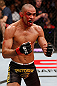 LONDON, ENGLAND - FEBRUARY 16:  Renan Barao reacts after defeating Michael McDonald in their interim bantamweight title fight during the UFC on Fuel TV event on February 16, 2013 at Wembley Arena in London, England.  (Photo by Josh Hedges/Zuffa LLC/Zuffa LLC via Getty Images)
