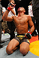LONDON, ENGLAND - FEBRUARY 16:  Renan Barao reacts after defeating Michael McDonald in their interim bantamweight title fight during the UFC on Fuel TV event on February 16, 2013 at Wembley Arena in London, England.  (Photo by Josh Hedges/Zuffa LLC/Zuffa LLC via Getty Images)