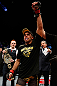 LONDON, ENGLAND - FEBRUARY 16:  Renan Barao reacts after defeating Michael McDonald in their interim bantamweight title fight during the UFC on Fuel TV event on February 16, 2013 at Wembley Arena in London, England.  (Photo by Josh Hedges/Zuffa LLC/Zuffa LLC via Getty Images)