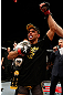 LONDON, ENGLAND - FEBRUARY 16:  Renan Barao reacts after defeating Michael McDonald in their interim bantamweight title fight during the UFC on Fuel TV event on February 16, 2013 at Wembley Arena in London, England.  (Photo by Josh Hedges/Zuffa LLC/Zuffa LLC via Getty Images)