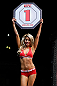 LONDON, ENGLAND - FEBRUARY 16:  UFC Octagon Girl Carly Baker introduces a round during the UFC on Fuel TV event on February 16, 2013 at Wembley Arena in London, England.  (Photo by Josh Hedges/Zuffa LLC/Zuffa LLC via Getty Images)