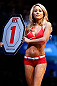 LONDON, ENGLAND - FEBRUARY 16:  UFC Octagon Girl Carly Baker introduces a round during the UFC on Fuel TV event on February 16, 2013 at Wembley Arena in London, England.  (Photo by Josh Hedges/Zuffa LLC/Zuffa LLC via Getty Images)