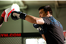 TORRANCE, CA - FEBRUARY 20:  Lyoto Machida conducts an open training session for fans and media at the UFC Gym on February 20, 2013 in Torrance, California.  (Photo by Josh Hedges/Zuffa LLC/Zuffa LLC via Getty Images)