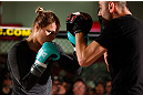 TORRANCE, CA - FEBRUARY 20:  Ronda Rousey conducts an open training session for fans and media at the UFC Gym on February 20, 2013 in Torrance, California.  (Photo by Josh Hedges/Zuffa LLC/Zuffa LLC via Getty Images)