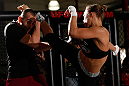 TORRANCE, CA - FEBRUARY 20:  Ronda Rousey conducts an open training session for fans and media at the UFC Gym on February 20, 2013 in Torrance, California.  (Photo by Josh Hedges/Zuffa LLC/Zuffa LLC via Getty Images)