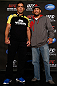 ANAHEIM, CA - FEBRUARY 21:  (L-R) Opponents Lyoto Machida and Dan Henderson pose for photos during a UFC pre-fight press conference at Honda Center on February 21, 2013 in Anaheim, California.  (Photo by Josh Hedges/Zuffa LLC/Zuffa LLC via Getty Images)