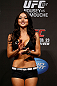 ANAHEIM, CA - FEBRUARY 22:  UFC Octagon Girl Arianny Celeste stands on stage during the UFC 157 weigh-in at Honda Center on February 22, 2013 in Anaheim, California.  (Photo by Josh Hedges/Zuffa LLC/Zuffa LLC via Getty Images)