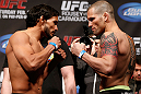 ANAHEIM, CA - FEBRUARY 22:  (L-R) Opponents Dennis Bermudez and Matt Grice face off during the UFC 157 weigh-in at Honda Center on February 22, 2013 in Anaheim, California.  (Photo by Josh Hedges/Zuffa LLC/Zuffa LLC via Getty Images)