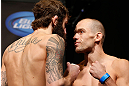 ANAHEIM, CA - FEBRUARY 22:  (L-R) Opponents Michael Chiesa and Anton Kuivanen face off during the UFC 157 weigh-in at Honda Center on February 22, 2013 in Anaheim, California.  (Photo by Josh Hedges/Zuffa LLC/Zuffa LLC via Getty Images)