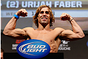 ANAHEIM, CA - FEBRUARY 22:  Urijah Faber weighs in during the UFC 157 weigh-in at Honda Center on February 22, 2013 in Anaheim, California.  (Photo by Josh Hedges/Zuffa LLC/Zuffa LLC via Getty Images)