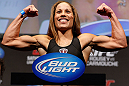 ANAHEIM, CA - FEBRUARY 22:  Liz Carmouche weighs in during the UFC 157 weigh-in at Honda Center on February 22, 2013 in Anaheim, California.  (Photo by Josh Hedges/Zuffa LLC/Zuffa LLC via Getty Images)