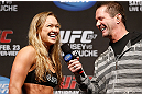 ANAHEIM, CA - FEBRUARY 22:  (L-R) Ronda Rousey is interviewed by Mike Goldberg during the UFC 157 weigh-in at Honda Center on February 22, 2013 in Anaheim, California.  (Photo by Josh Hedges/Zuffa LLC/Zuffa LLC via Getty Images)