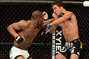 ANAHEIM, CA - FEBRUARY 23:  (L-R) Nah-Shon Burrell punches Yuri Villefort in their welterweight bout during UFC 157 at Honda Center on February 23, 2013 in Anaheim, California.  (Photo by Donald Miralle/Zuffa LLC/Zuffa LLC via Getty Images) *** Local Caption *** Nah-Shon Burrell; Yuri Villefort