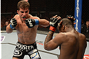 ANAHEIM, CA - FEBRUARY 23:  (L-R) Yuri Villefort punches Nah-Shon Burrellin their welterweight bout during UFC 157 at Honda Center on February 23, 2013 in Anaheim, California.  (Photo by Donald Miralle/Zuffa LLC/Zuffa LLC via Getty Images) *** Local Caption *** Nah-Shon Burrell; Yuri Villefort