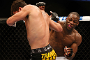 ANAHEIM, CA - FEBRUARY 23:  (R-L) Nah-Shon Burrell punches Yuri Villefort in their welterweight bout during UFC 157 at Honda Center on February 23, 2013 in Anaheim, California.  (Photo by Josh Hedges/Zuffa LLC/Zuffa LLC via Getty Images) *** Local Caption *** Nah-Shon Burrell; Yuri Villefort