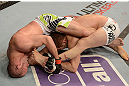 ANAHEIM, CA - FEBRUARY 23:  Kenny Robertson (left) attempts to submit Brock Jardine in their welterweight bout during UFC 157 at Honda Center on February 23, 2013 in Anaheim, California.  (Photo by Donald Miralle/Zuffa LLC/Zuffa LLC via Getty Images) *** Local Caption *** Kenny Robertson; Brock Jardine