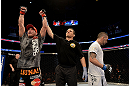 ANAHEIM, CA - FEBRUARY 23:  Sam Stout reacts to his victoy over Caros Fodor (right) in their lightweight bout during UFC 157 at Honda Center on February 23, 2013 in Anaheim, California.  (Photo by Donald Miralle/Zuffa LLC/Zuffa LLC via Getty Images) *** Local Caption *** Sam Stout; Caros Fodor