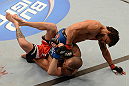 ANAHEIM, CA - FEBRUARY 23:  Dennis Bermudez (top) punches Matt Grice in their featherweight bout during UFC 157 at Honda Center on February 23, 2013 in Anaheim, California.  (Photo by Donald Miralle/Zuffa LLC/Zuffa LLC via Getty Images) *** Local Caption *** Dennis Bermudez; Matt Grice