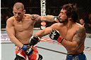 ANAHEIM, CA - FEBRUARY 23:  (R-L) Dennis Bermudez punches Matt Grice in their featherweight bout during UFC 157 at Honda Center on February 23, 2013 in Anaheim, California.  (Photo by Donald Miralle/Zuffa LLC/Zuffa LLC via Getty Images) *** Local Caption *** Dennis Bermudez; Matt Grice