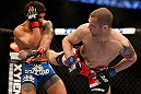 ANAHEIM, CA - FEBRUARY 23:  Matt Grice (right) kicks Dennis Bermudez in their featherweight bout during UFC 157 at Honda Center on February 23, 2013 in Anaheim, California.  (Photo by Josh Hedges/Zuffa LLC/Zuffa LLC via Getty Images) *** Local Caption *** Dennis Bermudez; Matt Grice