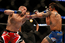 ANAHEIM, CA - FEBRUARY 23:  Matt Grice (left) punches Dennis Bermudez in their featherweight bout during UFC 157 at Honda Center on February 23, 2013 in Anaheim, California.  (Photo by Josh Hedges/Zuffa LLC/Zuffa LLC via Getty Images) *** Local Caption *** Dennis Bermudez; Matt Grice