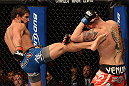 ANAHEIM, CA - FEBRUARY 23:  (L-R) Dennis Bermudez (left) kicks Matt Grice in their featherweight bout during UFC 157 at Honda Center on February 23, 2013 in Anaheim, California.  (Photo by Donald Miralle/Zuffa LLC/Zuffa LLC via Getty Images) *** Local Caption *** Dennis Bermudez; Matt Grice