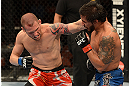 ANAHEIM, CA - FEBRUARY 23:  (L-R) Matt Grice punches Dennis Bermudez in their featherweight bout during UFC 157 at Honda Center on February 23, 2013 in Anaheim, California.  (Photo by Donald Miralle/Zuffa LLC/Zuffa LLC via Getty Images) *** Local Caption *** Dennis Bermudez; Matt Grice