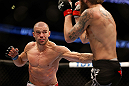 ANAHEIM, CA - FEBRUARY 23:  (L-R) Anton Kuivanen punches Michael Chiesa in their lightweight bout during UFC 157 at Honda Center on February 23, 2013 in Anaheim, California.  (Photo by Josh Hedges/Zuffa LLC/Zuffa LLC via Getty Images) *** Local Caption *** Michael Chiesa; Anton Kuivanen
