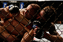 ANAHEIM, CA - FEBRUARY 23:  (R-L) Michael Chiesa attempts to submit Anton Kuivanen in their lightweight bout during UFC 157 at Honda Center on February 23, 2013 in Anaheim, California.  (Photo by Josh Hedges/Zuffa LLC/Zuffa LLC via Getty Images) *** Local Caption *** Michael Chiesa; Anton Kuivanen