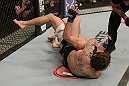 ANAHEIM, CA - FEBRUARY 23:  Michael Chiesa attempts to submit Anton Kuivanen in their lightweight bout during UFC 157 at Honda Center on February 23, 2013 in Anaheim, California.  (Photo by Donald Miralle/Zuffa LLC/Zuffa LLC via Getty Images) *** Local Caption *** Michael Chiesa; Anton Kuivanen