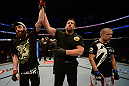 ANAHEIM, CA - FEBRUARY 23:  Michael Chiesa (left) is named the winner over Anton Kuivanen (right) after their lightweight bout during UFC 157 at Honda Center on February 23, 2013 in Anaheim, California.  (Photo by Donald Miralle/Zuffa LLC/Zuffa LLC via Getty Images) *** Local Caption *** Michael Chiesa; Anton Kuivanen