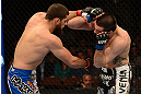 ANAHEIM, CA - FEBRUARY 23:  (L-R) Court McGee punches Josh Neer in their welterweight bout during UFC 157 at Honda Center on February 23, 2013 in Anaheim, California.  (Photo by Donald Miralle/Zuffa LLC/Zuffa LLC via Getty Images) *** Local Caption *** Court McGee; Josh Neer