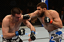 ANAHEIM, CA - FEBRUARY 23:  (R-L) Court McGee punches Josh Neer in their welterweight bout during UFC 157 at Honda Center on February 23, 2013 in Anaheim, California.  (Photo by Donald Miralle/Zuffa LLC/Zuffa LLC via Getty Images) *** Local Caption *** Court McGee; Josh Neer