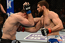 ANAHEIM, CA - FEBRUARY 23:  (R-L) Court McGee punches Josh Neer in their welterweight bout during UFC 157 at Honda Center on February 23, 2013 in Anaheim, California.  (Photo by Donald Miralle/Zuffa LLC/Zuffa LLC via Getty Images) *** Local Caption *** Court McGee; Josh Neer