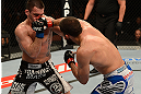 ANAHEIM, CA - FEBRUARY 23:  (R-L) Court McGee punches Josh Neer in their welterweight bout during UFC 157 at Honda Center on February 23, 2013 in Anaheim, California.  (Photo by Donald Miralle/Zuffa LLC/Zuffa LLC via Getty Images) *** Local Caption *** Court McGee; Josh Neer