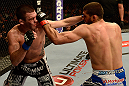ANAHEIM, CA - FEBRUARY 23:  (R-L) Court McGee punches Josh Neer in their welterweight bout during UFC 157 at Honda Center on February 23, 2013 in Anaheim, California.  (Photo by Donald Miralle/Zuffa LLC/Zuffa LLC via Getty Images) *** Local Caption *** Court McGee; Josh Neer