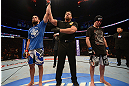 ANAHEIM, CA - FEBRUARY 23:  Court McGee (left) is declared the winner over Josh Neer in their welterweight bout during UFC 157 at Honda Center on February 23, 2013 in Anaheim, California.  (Photo by Donald Miralle/Zuffa LLC/Zuffa LLC via Getty Images) *** Local Caption *** Court McGee; Josh Neer