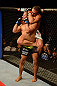 ANAHEIM, CA - FEBRUARY 23:  Urijah Faber (white shorts) attempts to submit Ivan Menjivar in their bantamweight bout during UFC 157 at Honda Center on February 23, 2013 in Anaheim, California.  (Photo by Donald Miralle/Zuffa LLC/Zuffa LLC via Getty Images) *** Local Caption *** Urijah Faber; Ivan Menjivar