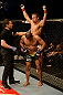 ANAHEIM, CA - FEBRUARY 23:  Urijah Faber (top) reacts to his submission victory over Ivan Menjivar (bottom) in their bantamweight bout during UFC 157 at Honda Center on February 23, 2013 in Anaheim, California.  (Photo by Donald Miralle/Zuffa LLC/Zuffa LLC via Getty Images) *** Local Caption *** Urijah Faber; Ivan Menjivar