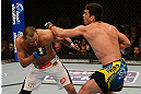ANAHEIM, CA - FEBRUARY 23:  (R-L) Lyoto Machida punches Dan Henderson in their light heavyweight bout during UFC 157 at Honda Center on February 23, 2013 in Anaheim, California.  (Photo by Donald Miralle/Zuffa LLC/Zuffa LLC via Getty Images) *** Local Caption *** Lyoto Machida; Dan Henderson