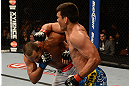 ANAHEIM, CA - FEBRUARY 23:  (R-L) Lyoto Machida punches Dan Henderson in their light heavyweight bout during UFC 157 at Honda Center on February 23, 2013 in Anaheim, California.  (Photo by Donald Miralle/Zuffa LLC/Zuffa LLC via Getty Images) *** Local Caption *** Lyoto Machida; Dan Henderson