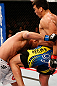 ANAHEIM, CA - FEBRUARY 23:  (R-L) Lyoto Machida knees Dan Henderson in their light heavyweight bout during UFC 157 at Honda Center on February 23, 2013 in Anaheim, California.  (Photo by Josh Hedges/Zuffa LLC/Zuffa LLC via Getty Images) *** Local Caption *** Lyoto Machida; Dan Henderson