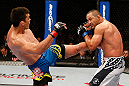 ANAHEIM, CA - FEBRUARY 23:  (L-R) Lyoto Machida kicks Dan Henderson in their light heavyweight bout during UFC 157 at Honda Center on February 23, 2013 in Anaheim, California.  (Photo by Josh Hedges/Zuffa LLC/Zuffa LLC via Getty Images) *** Local Caption *** Lyoto Machida; Dan Henderson