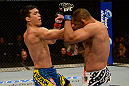 ANAHEIM, CA - FEBRUARY 23:  (L-R) Lyoto Machida punches Dan Henderson in their light heavyweight bout during UFC 157 at Honda Center on February 23, 2013 in Anaheim, California.  (Photo by Donald Miralle/Zuffa LLC/Zuffa LLC via Getty Images) *** Local Caption *** Lyoto Machida; Dan Henderson