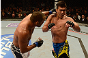 ANAHEIM, CA - FEBRUARY 23:  (L-R) Dan Henderson punches Lyoto Machida in their light heavyweight bout during UFC 157 at Honda Center on February 23, 2013 in Anaheim, California.  (Photo by Donald Miralle/Zuffa LLC/Zuffa LLC via Getty Images) *** Local Caption *** Lyoto Machida; Dan Henderson
