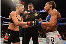 ANAHEIM, CA - FEBRUARY 23:  Ronda Rousey (left) and Liz Carmouche (right) touch gloves in their women's bantamweight title fight during UFC 157 at Honda Center on February 23, 2013 in Anaheim, California.  (Photo by Donald Miralle/Zuffa LLC/Zuffa LLC via Getty Images) *** Local Caption *** Ronda Rousey; Liz Carmouche