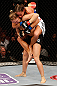 ANAHEIM, CA - FEBRUARY 23:  Liz Carmouche (top) attempts to submit Ronda Rousey in their women's bantamweight title fight during UFC 157 at Honda Center on February 23, 2013 in Anaheim, California.  (Photo by Josh Hedges/Zuffa LLC/Zuffa LLC via Getty Images) *** Local Caption *** Ronda Rousey; Liz Carmouche