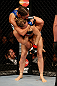 ANAHEIM, CA - FEBRUARY 23:  Liz Carmouche (top) attempts to submit Ronda Rousey in their women's bantamweight title fight during UFC 157 at Honda Center on February 23, 2013 in Anaheim, California.  (Photo by Josh Hedges/Zuffa LLC/Zuffa LLC via Getty Images) *** Local Caption *** Ronda Rousey; Liz Carmouche