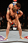 ANAHEIM, CA - FEBRUARY 23:  Liz Carmouche (top) attempts to submit Ronda Rousey in their women's bantamweight title fight during UFC 157 at Honda Center on February 23, 2013 in Anaheim, California.  (Photo by Josh Hedges/Zuffa LLC/Zuffa LLC via Getty Images) *** Local Caption *** Ronda Rousey; Liz Carmouche